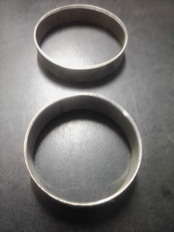 STAINLESS STEEL RINGS: 52 mm AND 63mm DIAMETER.  NON MAGNECTIC.  R2.00 EACH.
