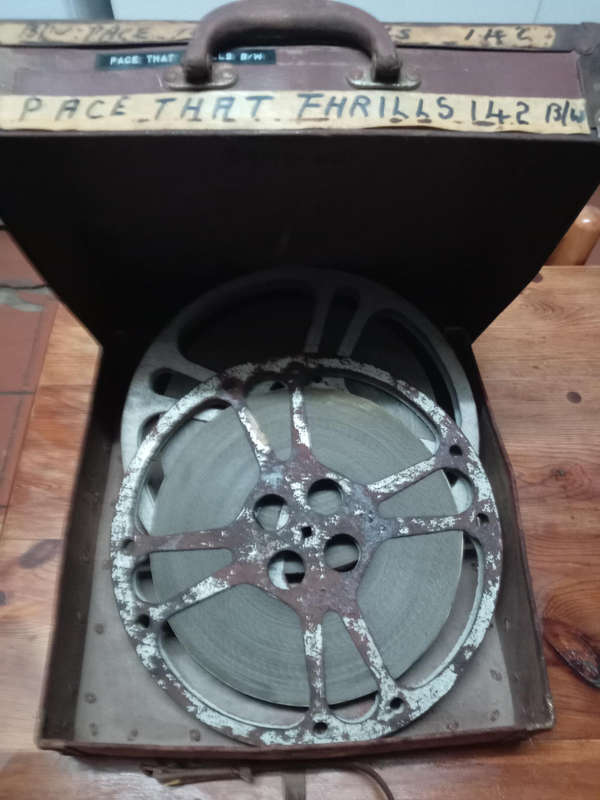 16mm MOVIE REELS IN CASE. " THE PACE THAT PHRILLS"