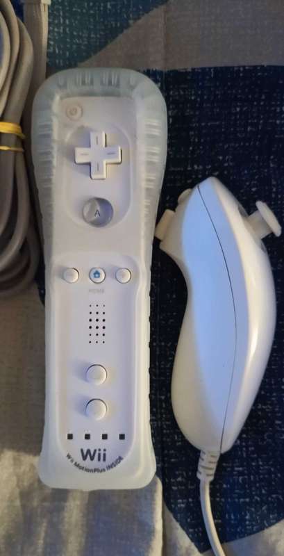 Nintendo Wii boxed console with 16 games