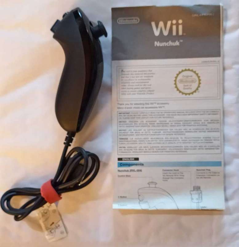 Original Nintendo Wii Nunchuck with manual