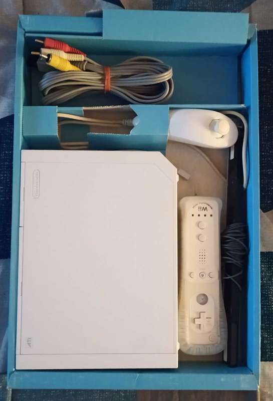 Nintendo Wii boxed console with 16 games