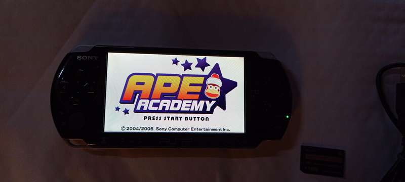 PSP Console 3004 with 8 games