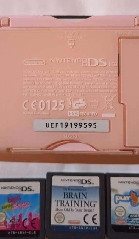 Pink Nintendo DS Lite with pouch and 4 games