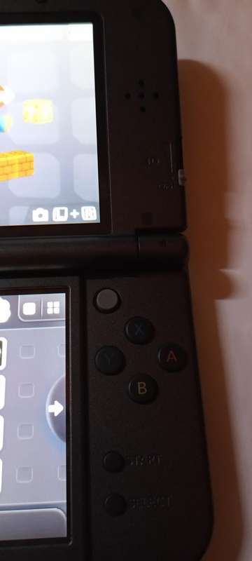 "New" Nintendo 3DS XL Console with extras