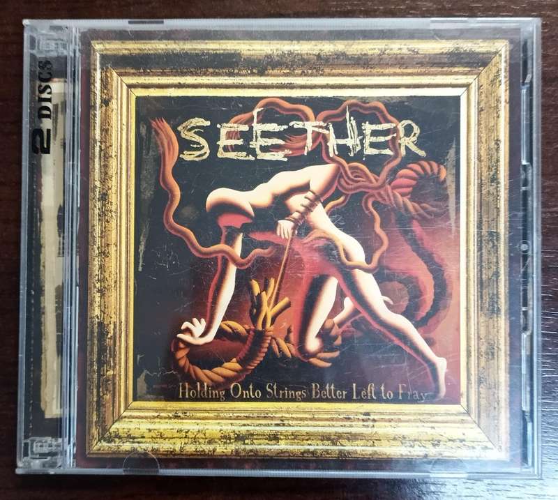 Seether Holding on to Strings Better left to Fray (CD + DVD) Mint