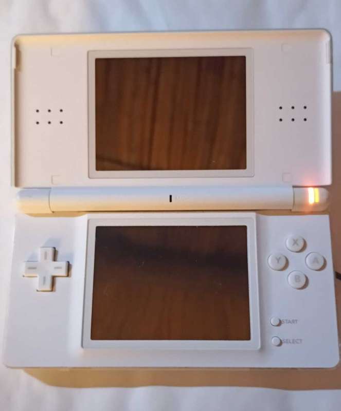 Nintendo DS Lite Console w/ original charger + 2 games