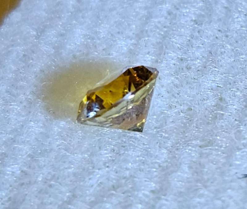 Diamond - 0.79ct - Fancy Vivid Orange Yellow