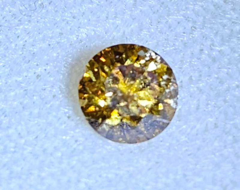 Diamond - 0.79ct - Fancy Vivid Orange Yellow