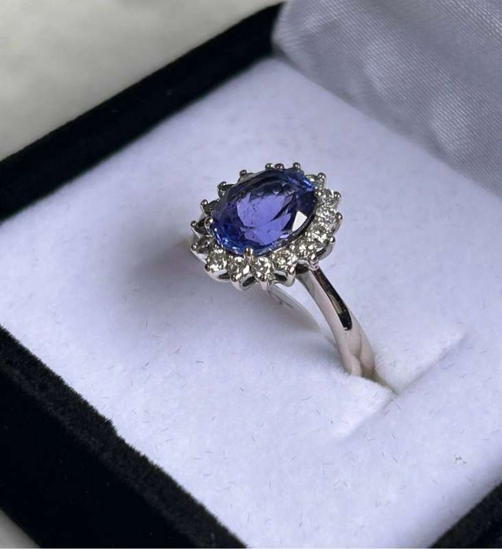 18ct White Gold Tanzanite and Diamond Halo Design Ring