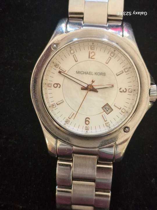 Michael Kors Mans watch. Stainless steel bracelet.