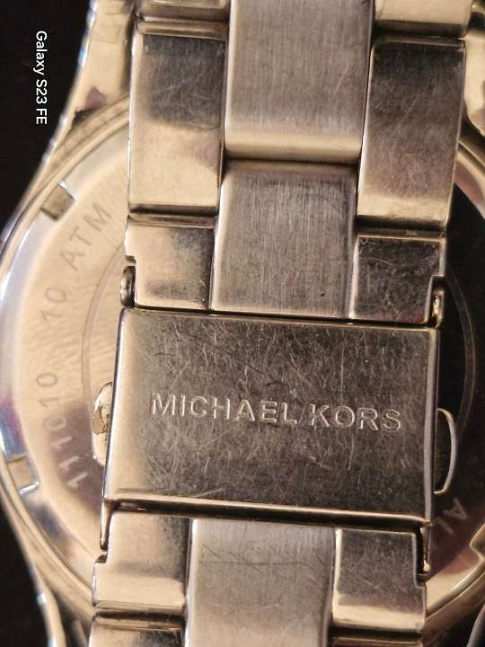 Michael Kors Mans watch. Stainless steel bracelet.