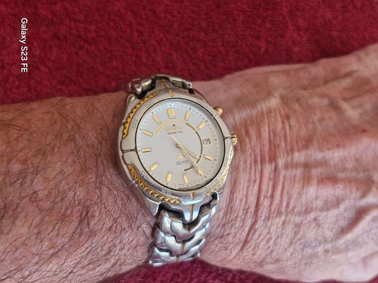 Vintage SEIKO SQ100 Kinetic Mans Watch in good working condition !