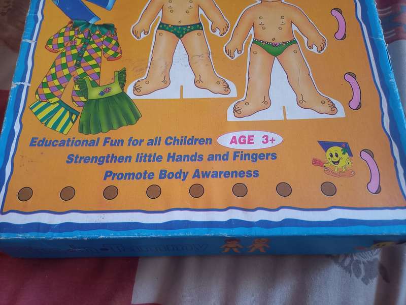 Smile - Tim 'n Tammy - dress a doll - educational