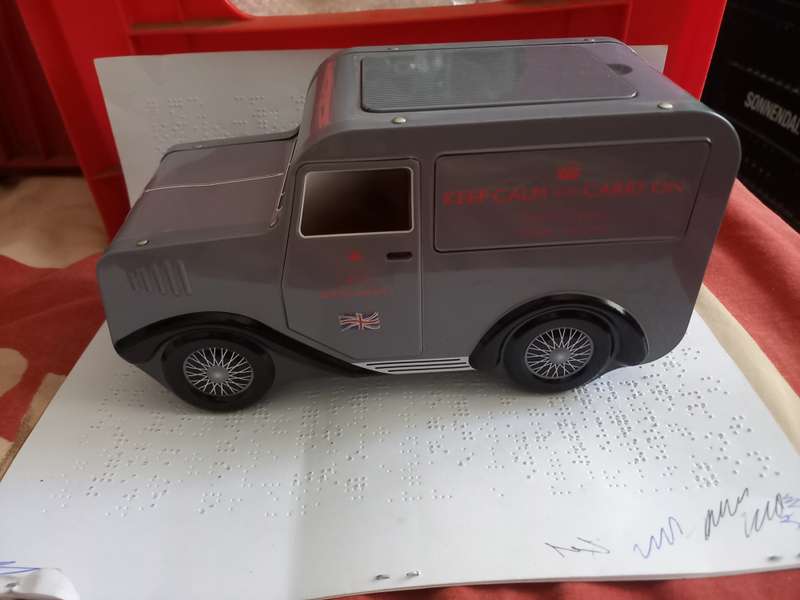 Tin - grey small truck