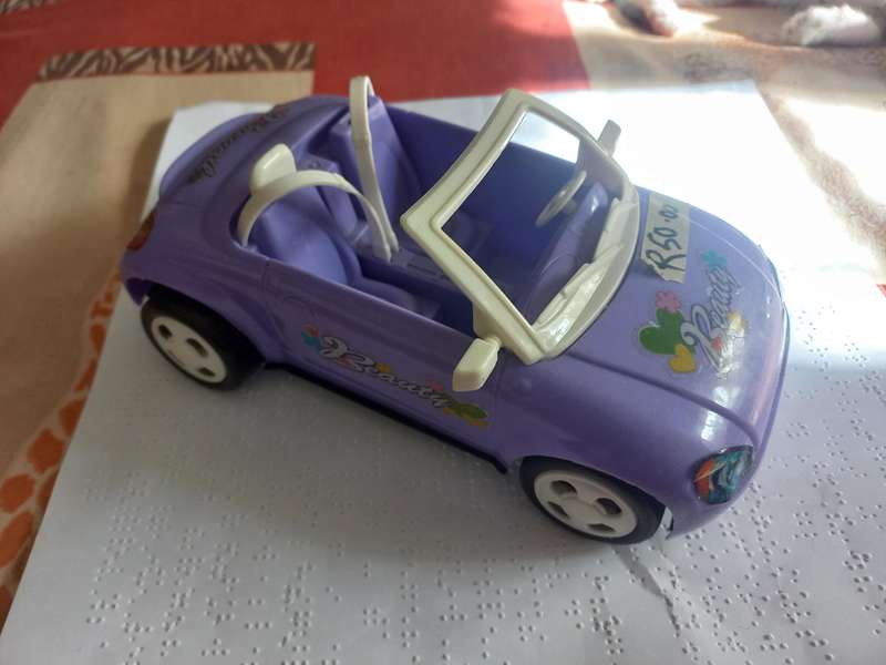 Plastic car for small dolls