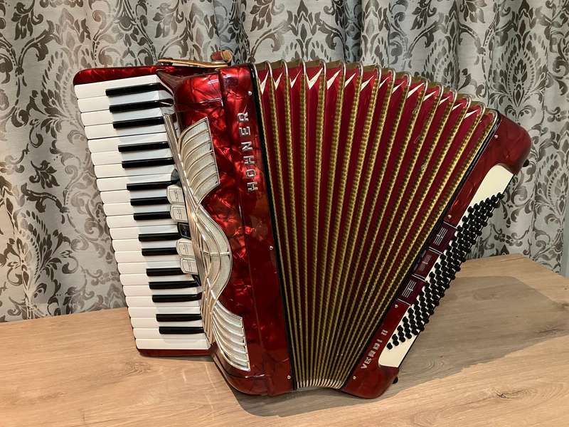 Hohner Verdi II Accordion in red white and gold
