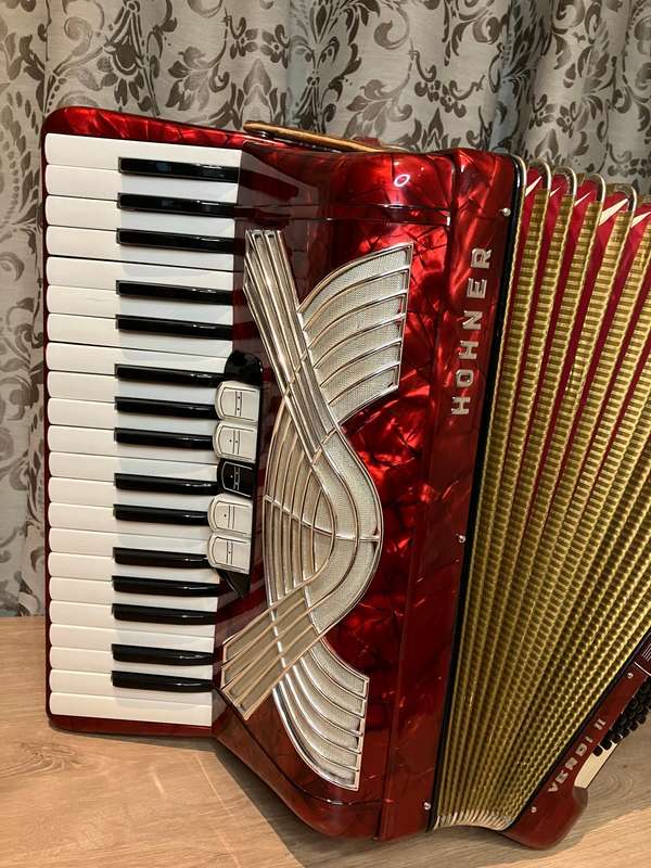 Hohner Verdi II Accordion in red white and gold