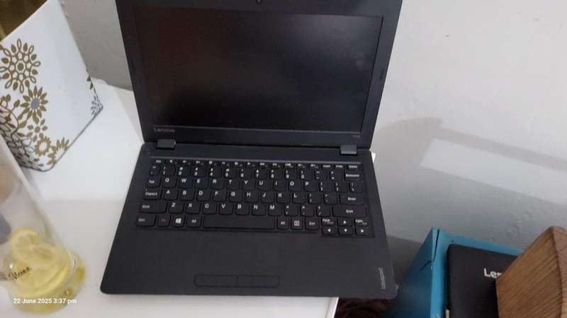 Small Non-Working Lenova Laptop with Charger for R590
