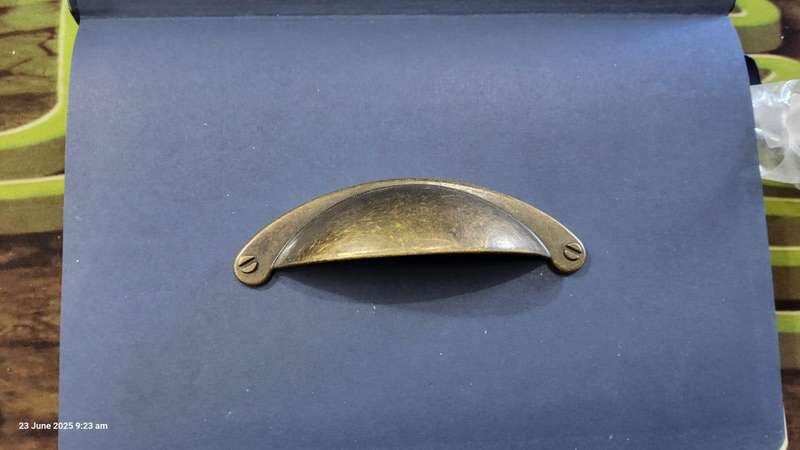 Buttercup Handle 64mm Antique Brass