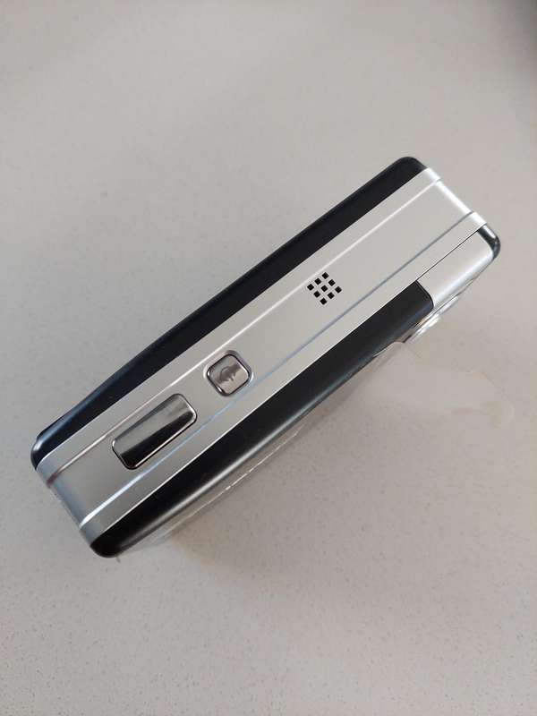 Poloroid Pogo instant digital camera (LIKE NEW) still has plastics on the camera.