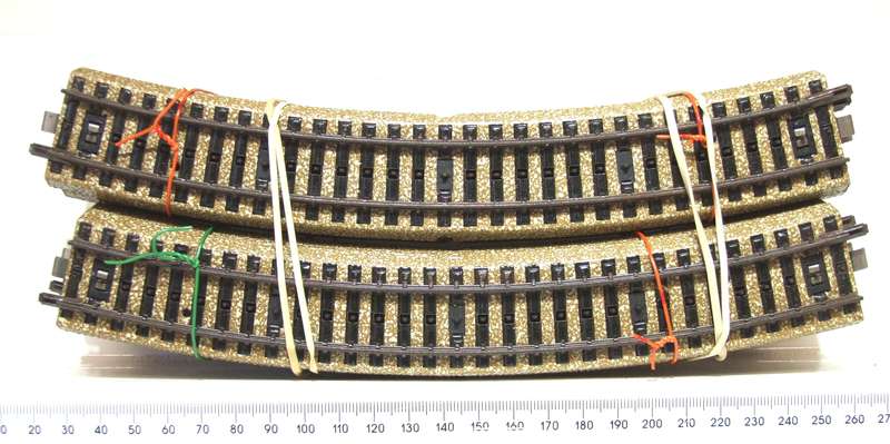 MARKLIN HO:  12pc Metal Curved M-Track with Metal Underlay in Good, Used Condition.(W Germany)