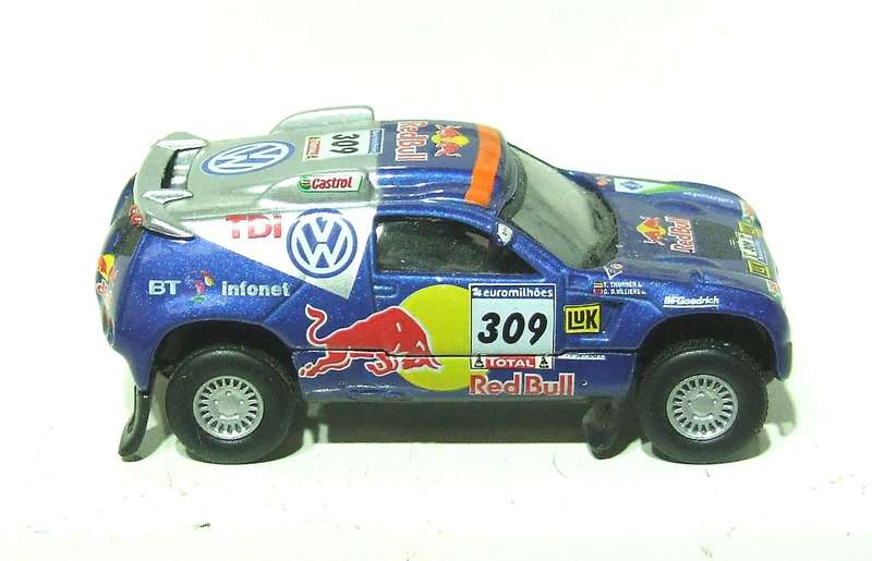 SCHUCO HO: Highly Detailed VW Red Bull Rally Car in Very Good Un-Boxed Condition.