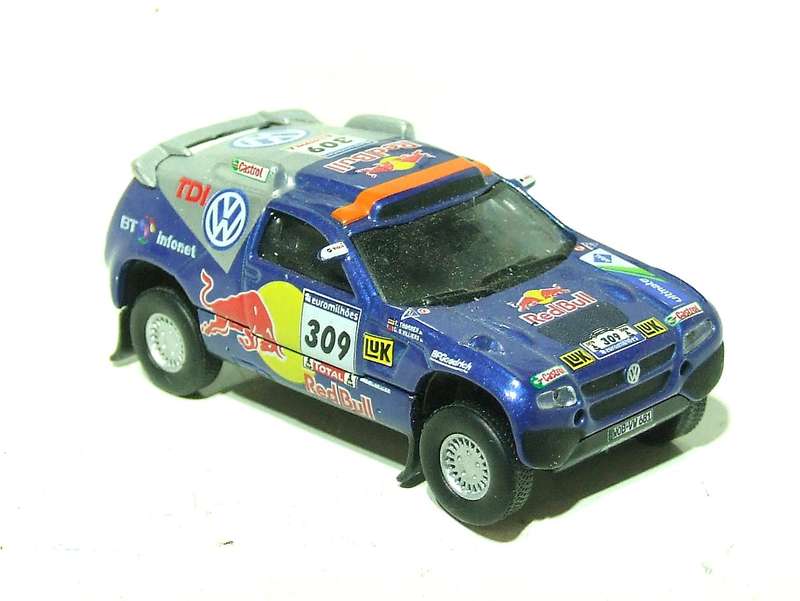 SCHUCO HO: Highly Detailed VW Red Bull Rally Car in Very Good Un-Boxed Condition.