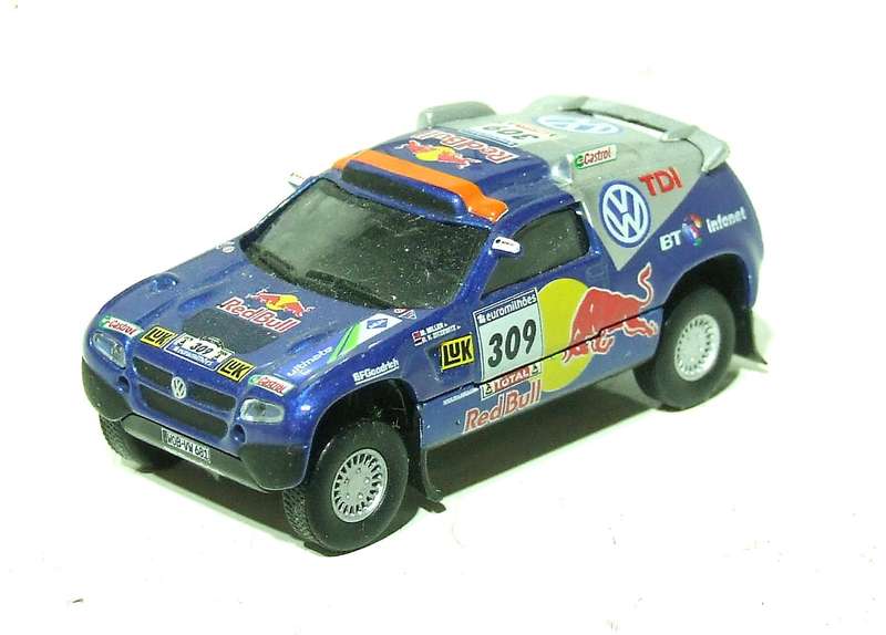 SCHUCO HO: Highly Detailed VW Red Bull Rally Car in Very Good Un-Boxed Condition.