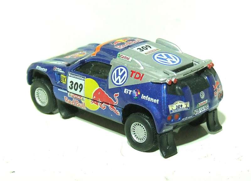 SCHUCO HO: Highly Detailed VW Red Bull Rally Car in Very Good Un-Boxed Condition.