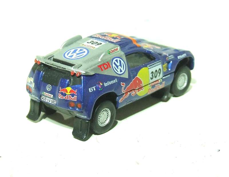 SCHUCO HO: Highly Detailed VW Red Bull Rally Car in Very Good Un-Boxed Condition.