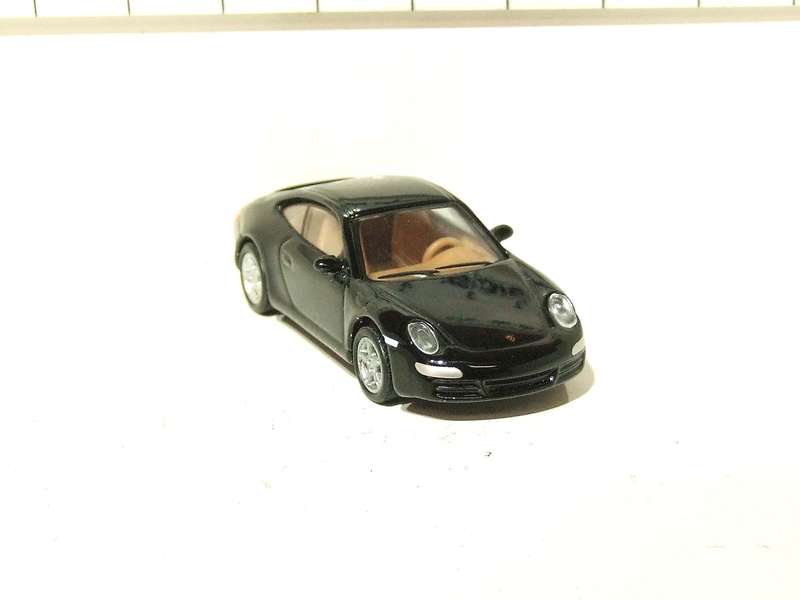 SCHUCO HO: Highly Detailed Porsche Carrera S in Very Good Un-Boxed Condition.