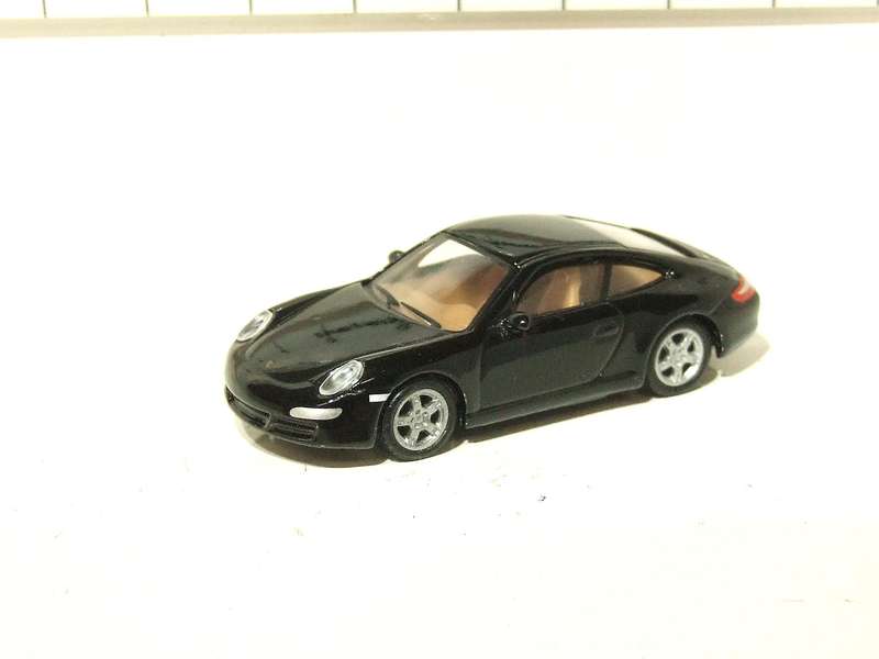 SCHUCO HO: Highly Detailed Porsche Carrera S in Very Good Un-Boxed Condition.