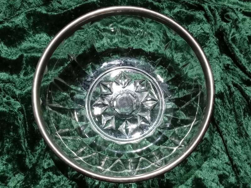 Large heavy Italian glass salad bowl with a metal trim