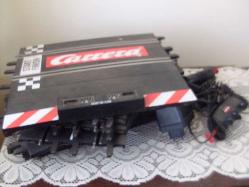 JOBLOT OF CARRERA MOTOR RACING ADD ON/REPLACEMENT LARGE TRACKS AND 2 REMOTES...