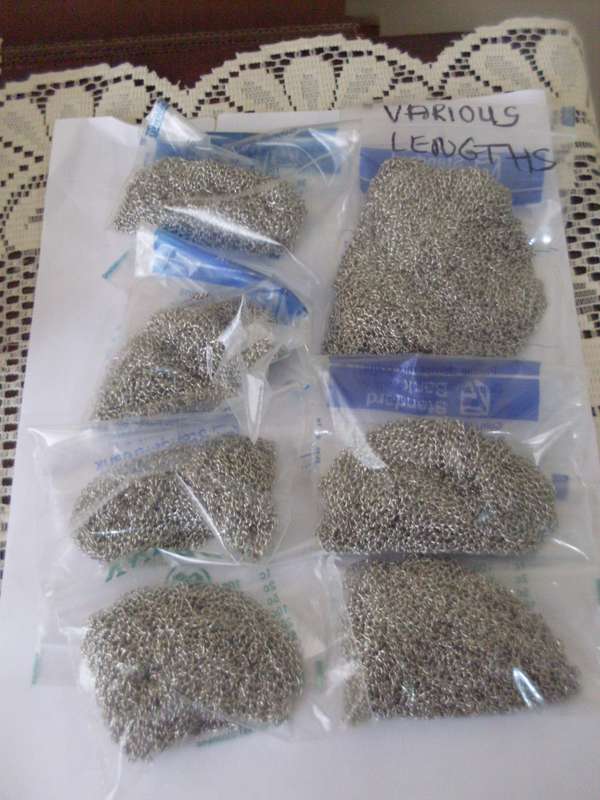 MANY METERS OF SILVER COLOUR CHAIN AND  100'S OF FINDINGS SILVER COLOURJUMP RINGS