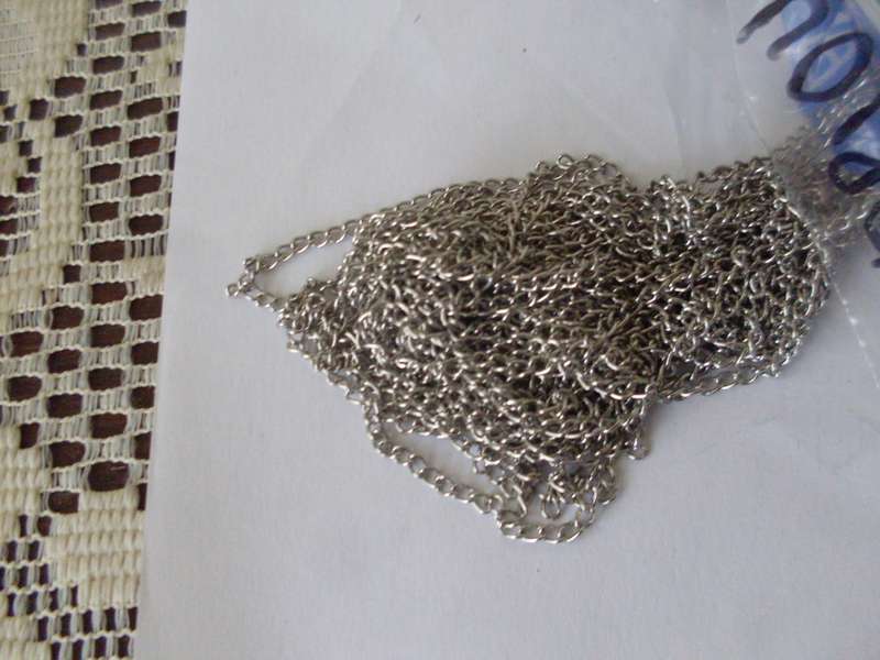 MANY METERS OF SILVER COLOUR CHAIN AND  100'S OF FINDINGS SILVER COLOURJUMP RINGS