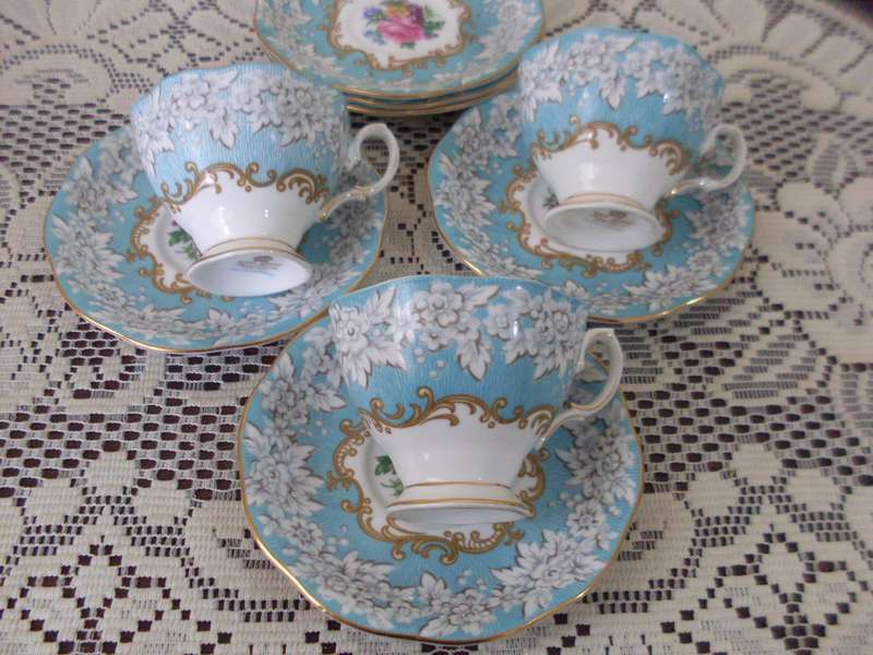 3 ROYAL ALBERT SMALL CUP DUOS AND 3 SPARE SAUCERS...ENCHANTMENT PATTERN
