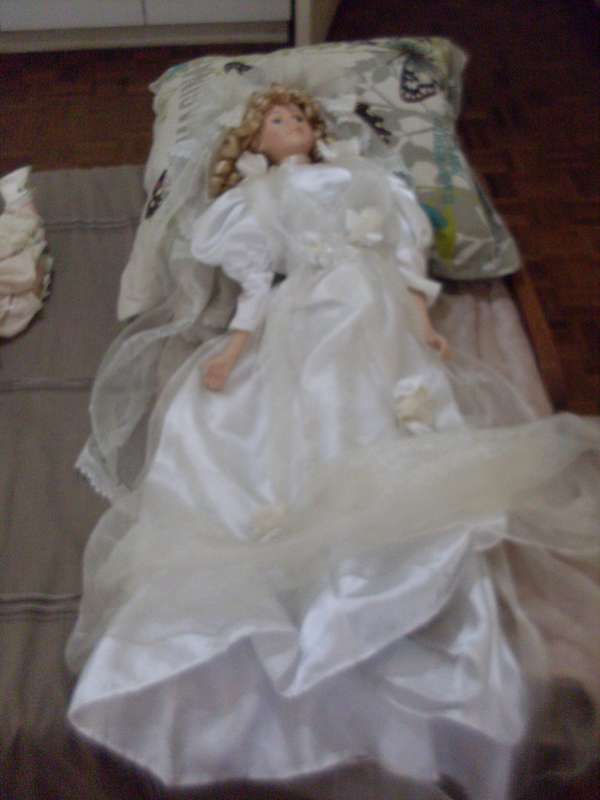 DRESSED BRIDE PORCELAIN DOLL....62 CM...WITH STAND