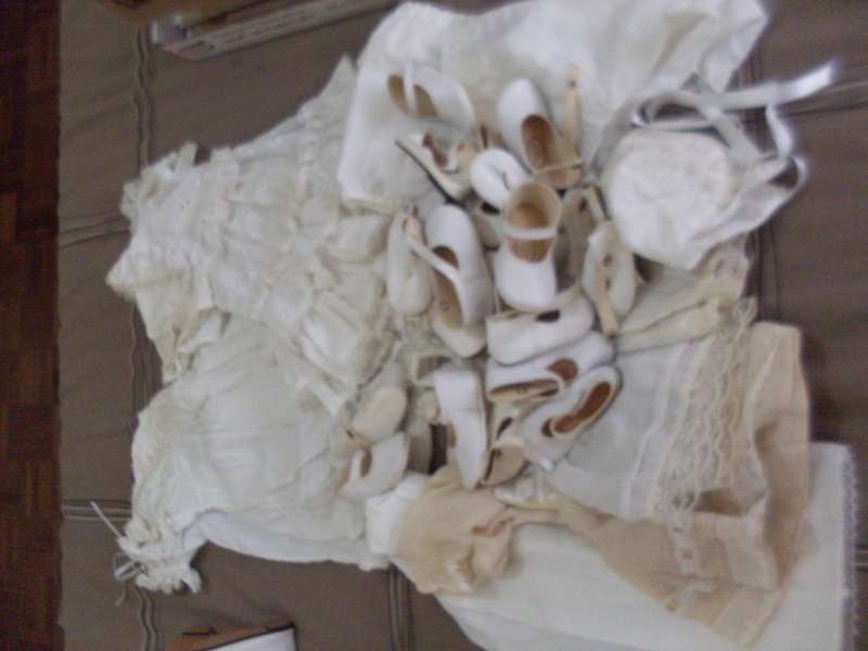 DOLLS CLOTHING AND 11 PAIRS  WHITE  DOLLS SHOES