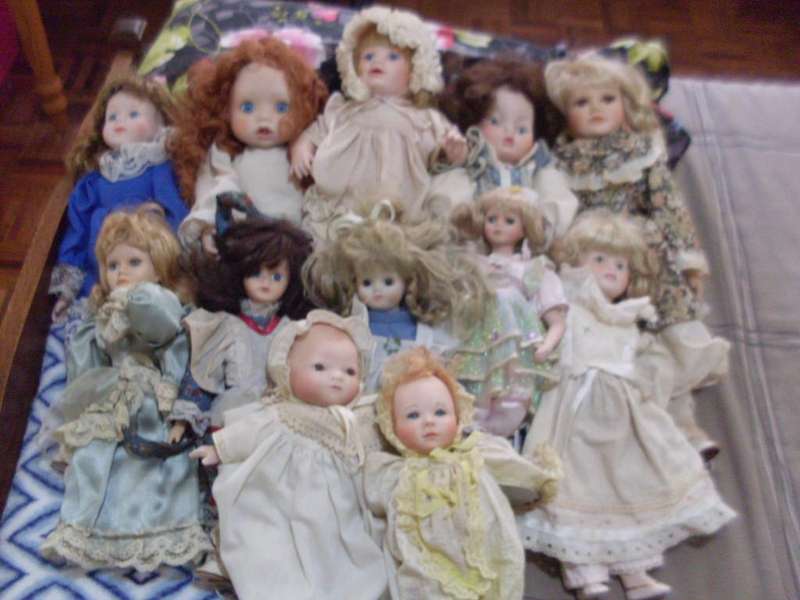 A COLLECTION OF VARIOUS SWEET PORCELAIN DOLLS