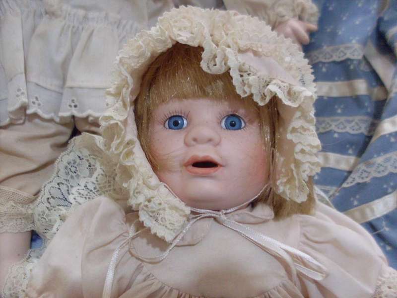 A COLLECTION OF VARIOUS SWEET PORCELAIN DOLLS