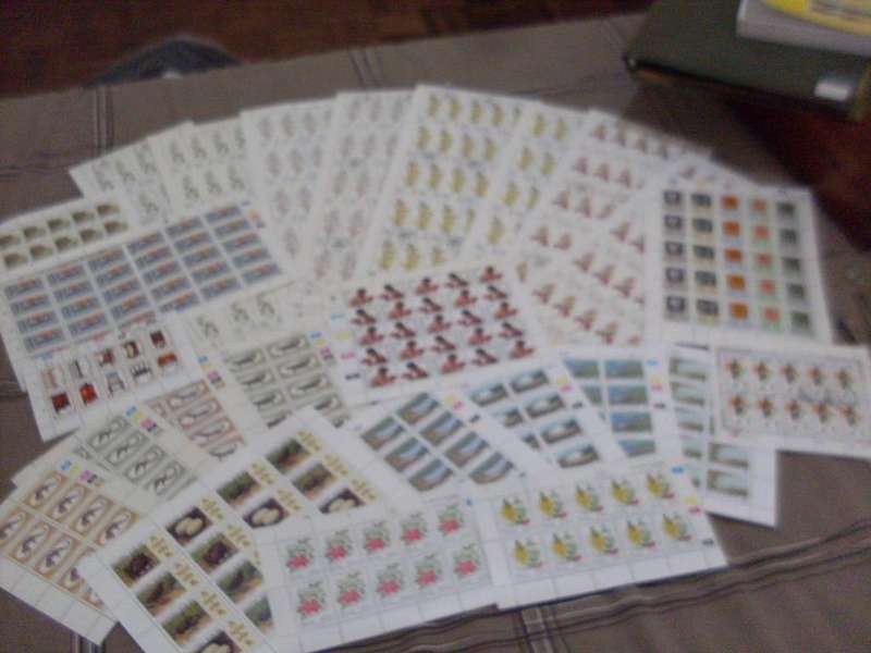 25 FULL  POSTAL SHEETS OF STAMPS OF SA AND OTHER COUNTRIES