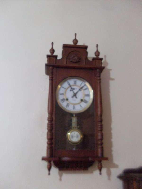 PRETTY BLESSING CLOCK WITH BEAUTIFUL DECORATIVE PIECES....WORKING