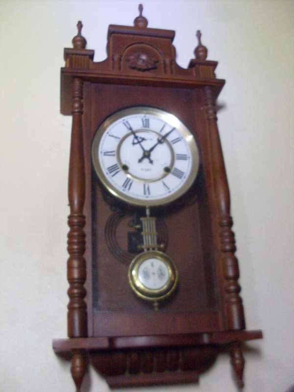 PRETTY BLESSING CLOCK WITH BEAUTIFUL DECORATIVE PIECES....WORKING