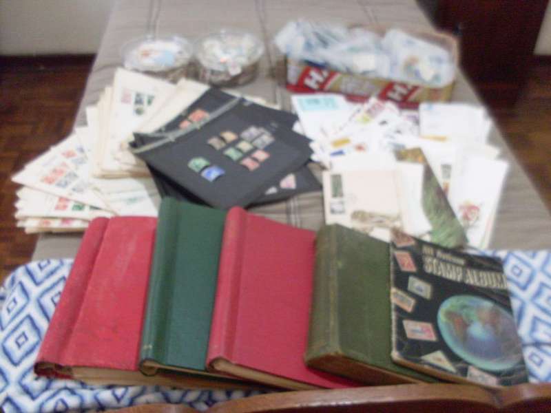 9.9 KG JOBLOT OF POSTAGE STAMPS IN BANK MONEY BAGS/ALBUMS/FDCS/PAGES OF STAMPS ETC