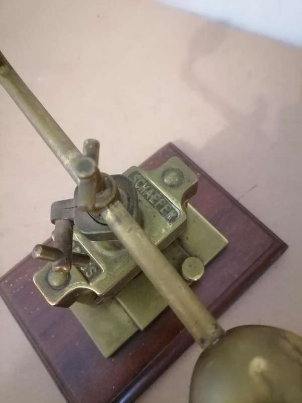 SCHAEFER BRASS NUT PRESS, 20TH CENTURY, THE CENTRAL SCREW SUPPORTED ON TWO COLUMNS, CAST MARK SCHAEF