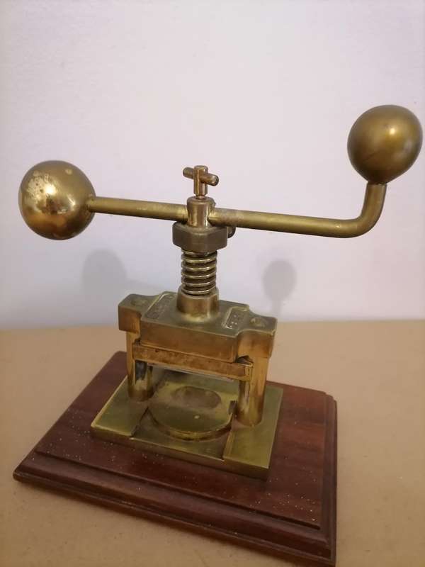 SCHAEFER BRASS NUT PRESS, 20TH CENTURY, THE CENTRAL SCREW SUPPORTED ON TWO COLUMNS, CAST MARK SCHAEF