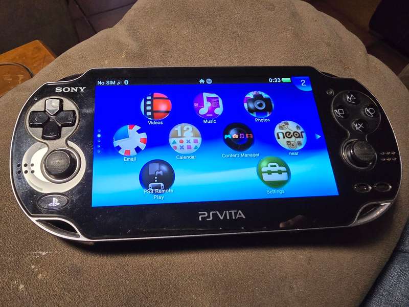 PS VITA PCH-1104 - sold with 128gb psvita pro memory card (adaptor) and charger (B19)