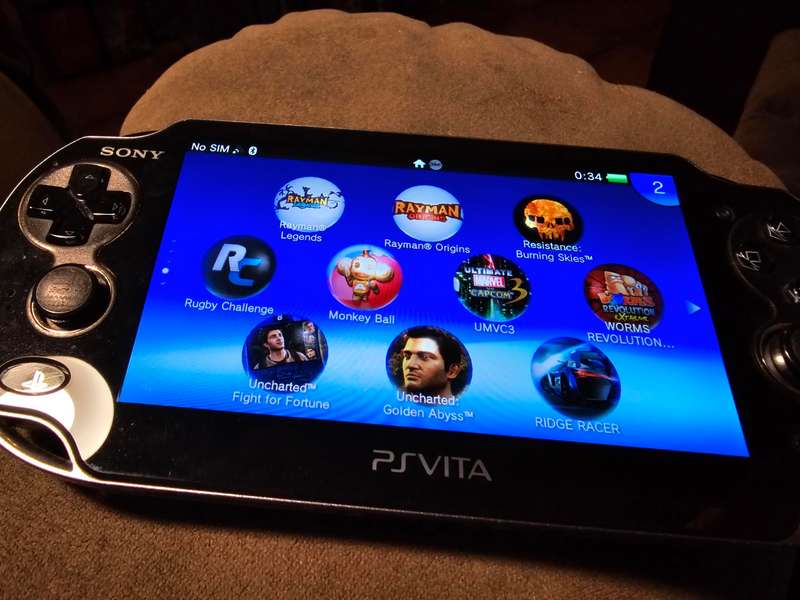 PS VITA PCH-1104 - sold with 128gb psvita pro memory card (adaptor) and charger (B19)