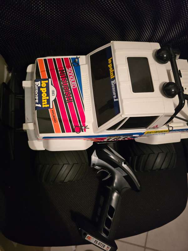 Tamiya - Mitsubishi - Built ready to run 1:10 sold with rechargeable Flysky controller